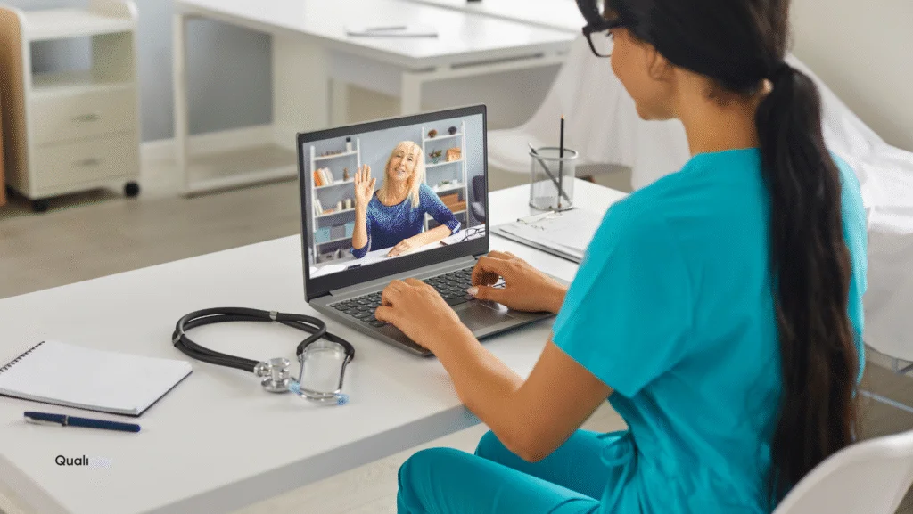 Nurse conducting a telehealth consultation for UTI treatment via video call, using a laptop in a medical clinic setting — Qualiphy telehealth for UTI.