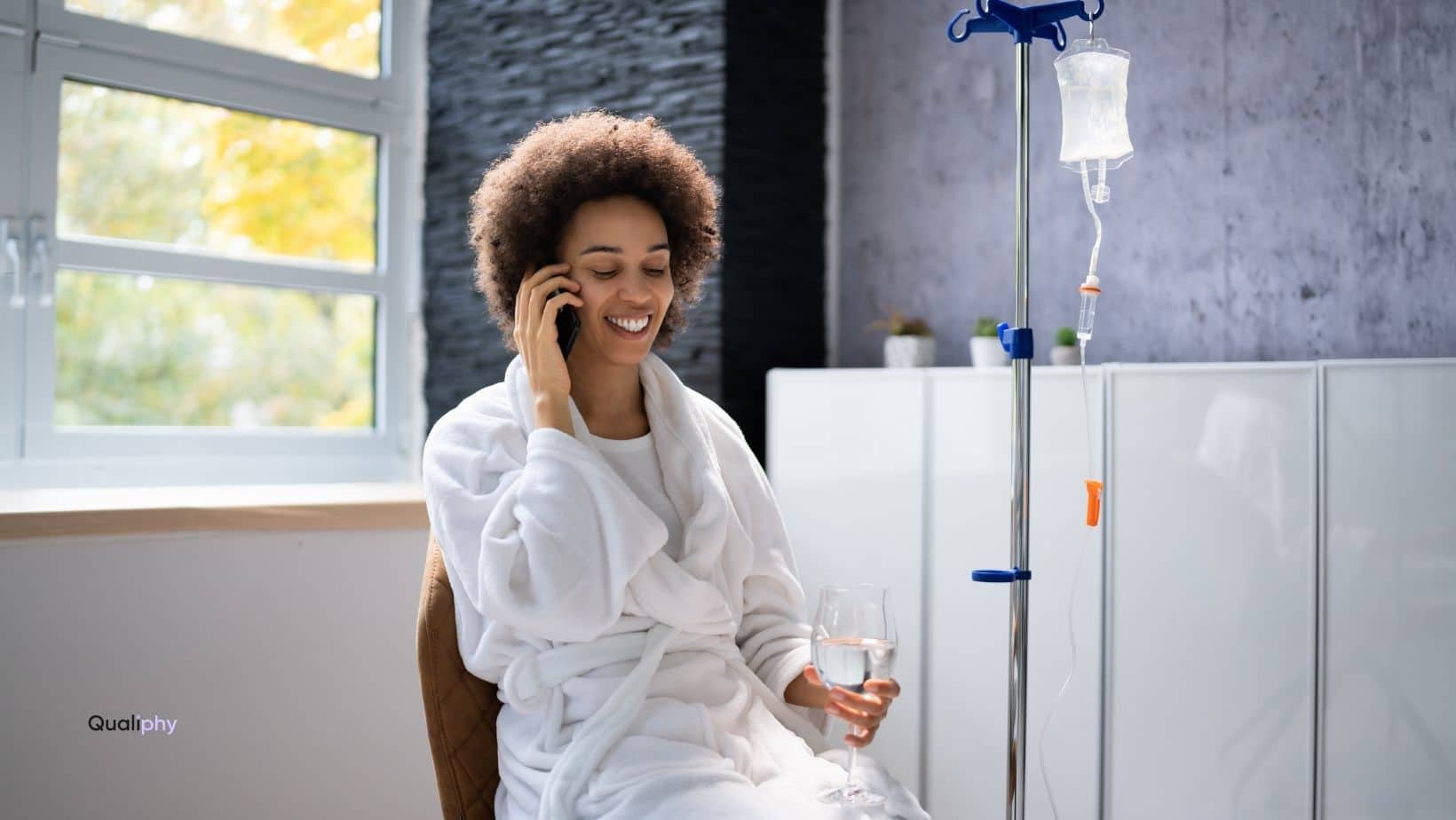 Close-up of an IV therapy drip bag hanging in a clinic setting, representing new safety and compliance requirements under Jenifer’s Law (HB 3749) for Texas wellness and medspa providers.