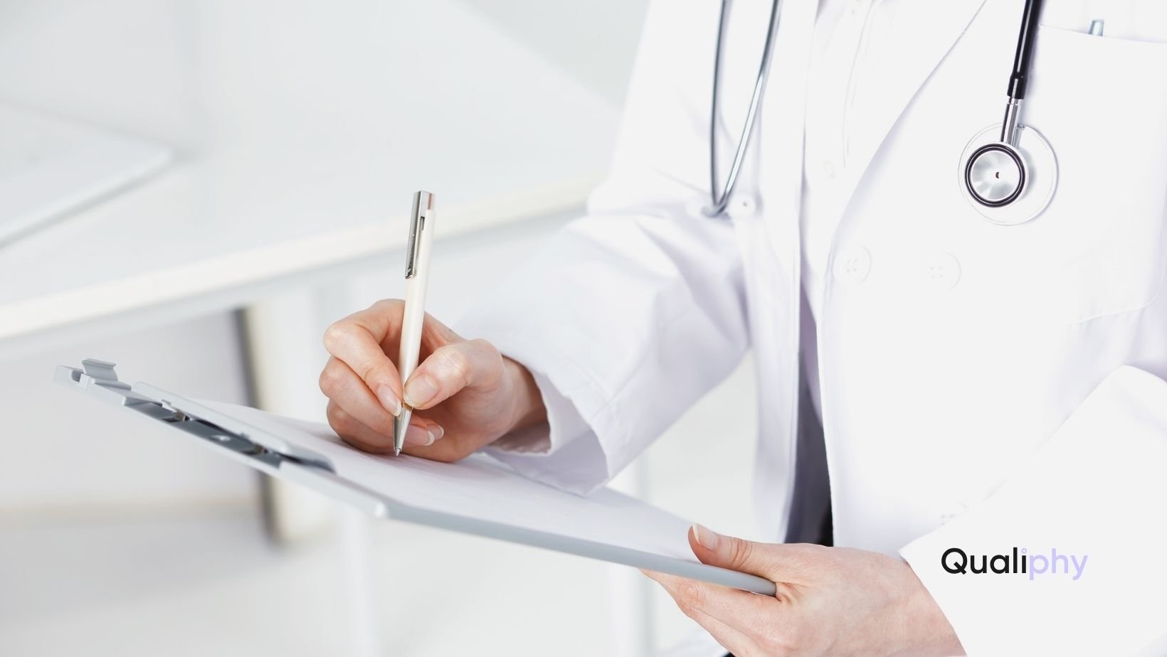 A licensed medical doctor reviewing delegation and supervision agreements for IV therapy compliance in a medical spa, ensuring treatments meet state regulations under Jenifer’s Law and proper provider oversight.