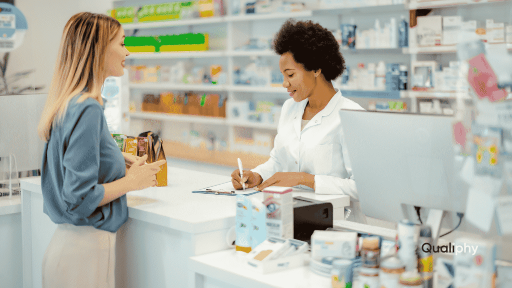 A pharmacist assisting a patient with a prescription that was issued through on-demand telemedicine, illustrating how virtual medical consultations can lead to fast, accessible prescription fulfillment.]