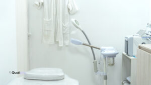 Modern med spa treatment room designed for delivering longevity services for med spas with advanced aesthetic equipment and patient bed