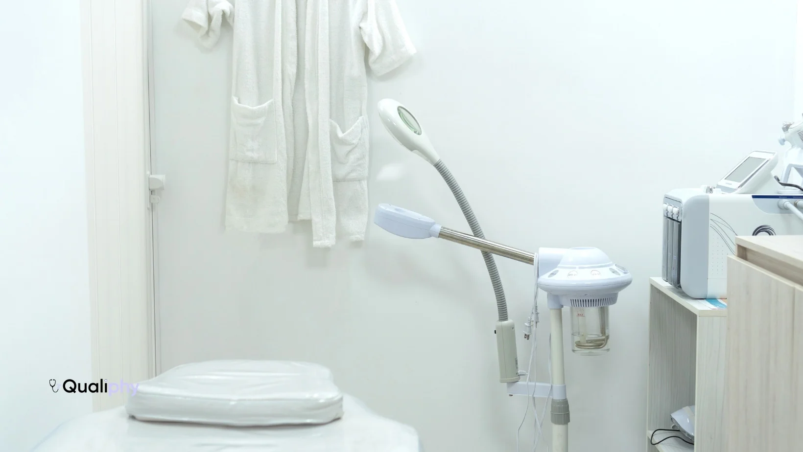 Modern med spa treatment room designed for delivering longevity services for med spas with advanced aesthetic equipment and patient bed